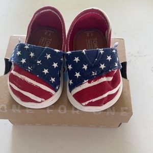 Tom’s Americana never been worn size Tiny 2